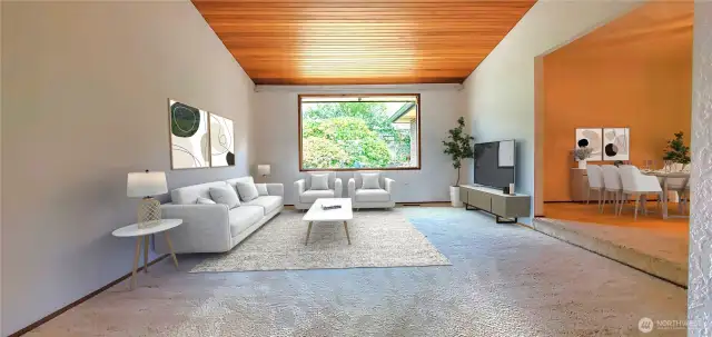 Formal living room w/vaulted ceiling. Attached formal dining room. Virtual staged.