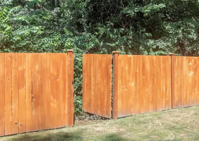 Three Gates in fully fenced back yard.