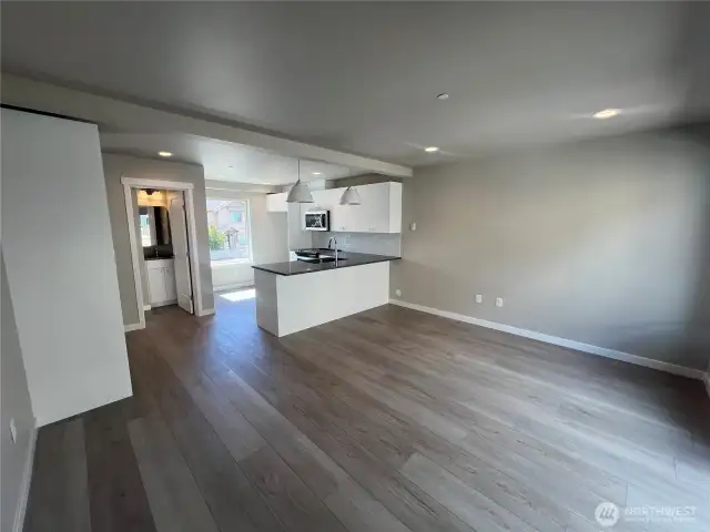Door left to kitchen leads to powder room