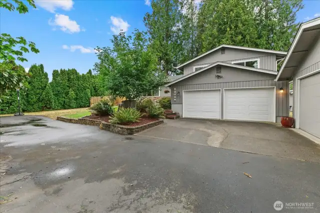 Separate detached/ shop garage to right. All windows replaced in the last year.