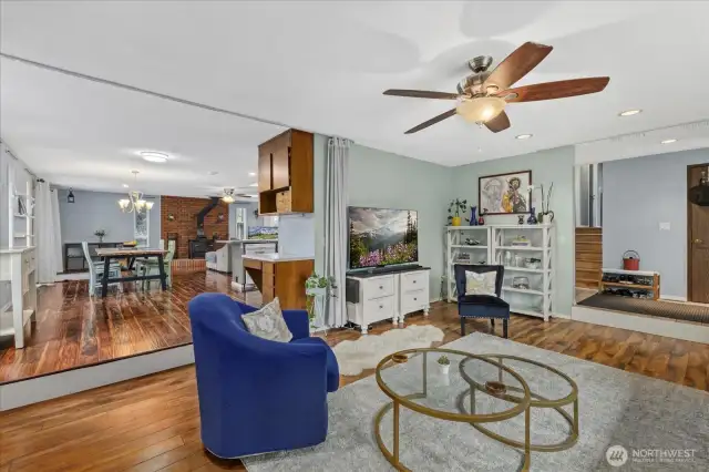 Lower living area opens to dining room above.