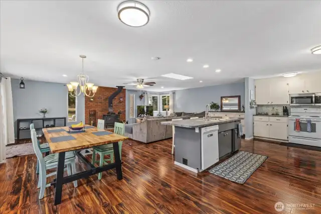 Open concept kitchen with eating and living space.