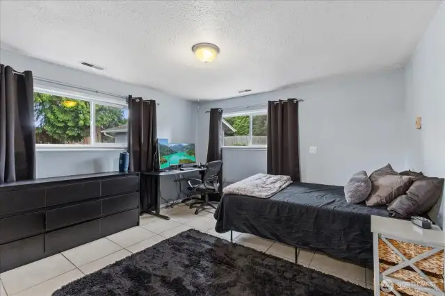Bedroom 4 is downstairs, could be another big living space/ office.  The possibilities are endless