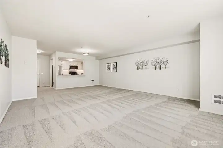 Inviting living room with abundant natural light.