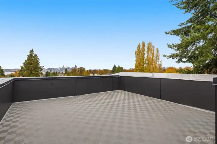 Expansive rooftop deck ties the home together. Whether its a space for you to relax & unwind or socialize & gather