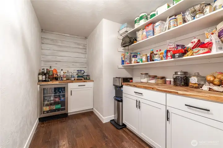 Butlers pantry with beverage refrigerator