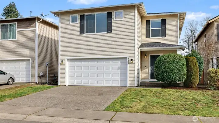 Architectural presence meets refined curb appeal—this impeccably maintained home makes a statement before you ever step inside.