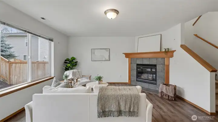 A warm and welcoming space featuring a cozy gas fireplace, ideal for relaxed evenings and gatherings.