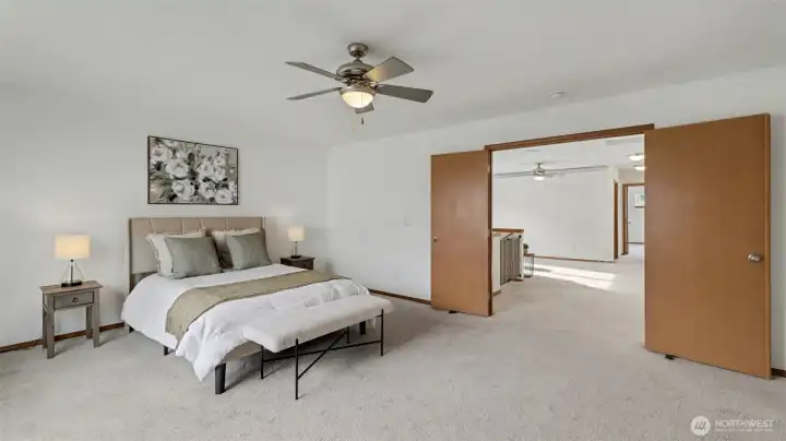 Elegant and airy, this master suite provides direct access to the adjacent ensuite bath for ultimate convenience.