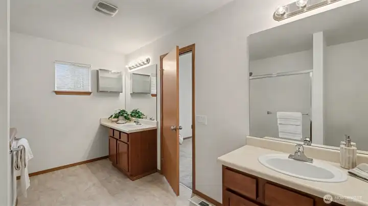 Elegantly designed for everyday luxury, featuring dual vanities and refined finishes that elevate your morning routine.