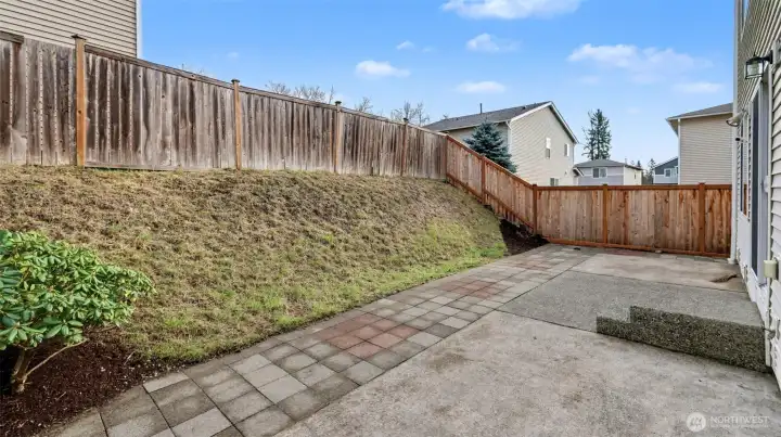 Entertain with ease on the large paver patio, ideal for BBQs, dining, and making memories