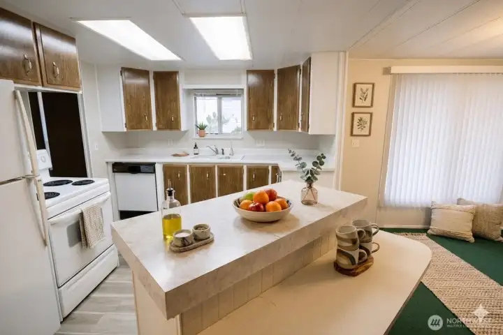 Kitchen.  Digitally staged for illustration purposes.