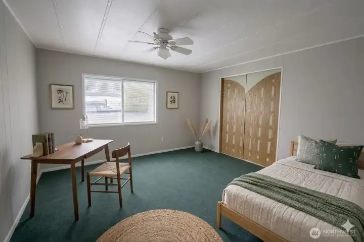 Bedroom 1.  Digitally staged for illustration purposes.