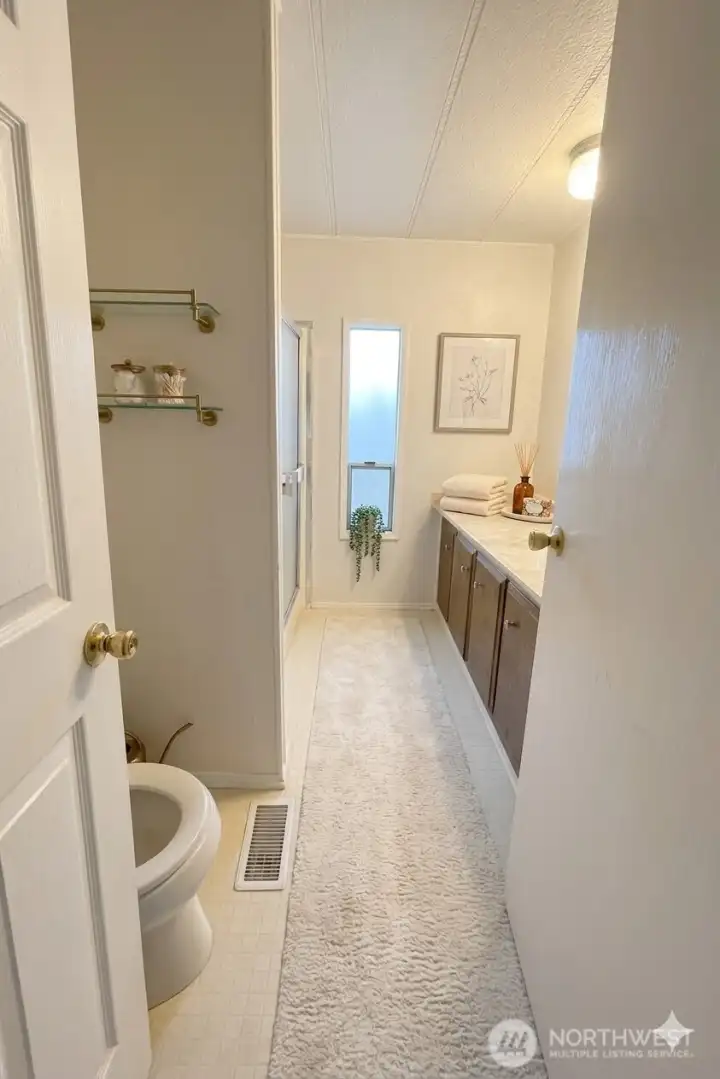 Bathroom.  Digitally staged for illustration purposes.