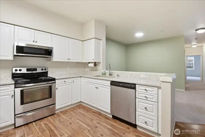 The kitchen opens up to a large dining room.