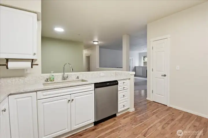 This home has an open floor plan for easy flow.  The pantry is in the door showing in the picture.  There is another pantry to the right that is not shown.