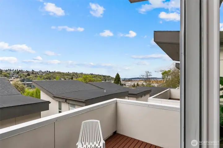Deck view with territorial outlook and partial city and water views.