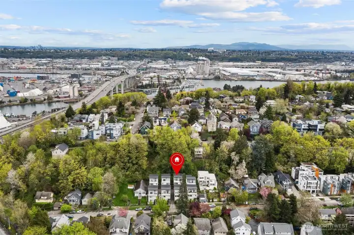 Aerial view showing location in Pigeon Point with proximity to West Seattle Bridge, Duwamish Waterway, and downtown Seattle skyline.