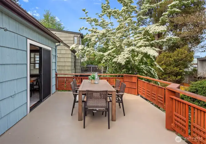 Large deck is ideal space for dinner al fresco with family or friends...or both.