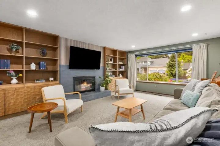 Living room with built ins on the main level
