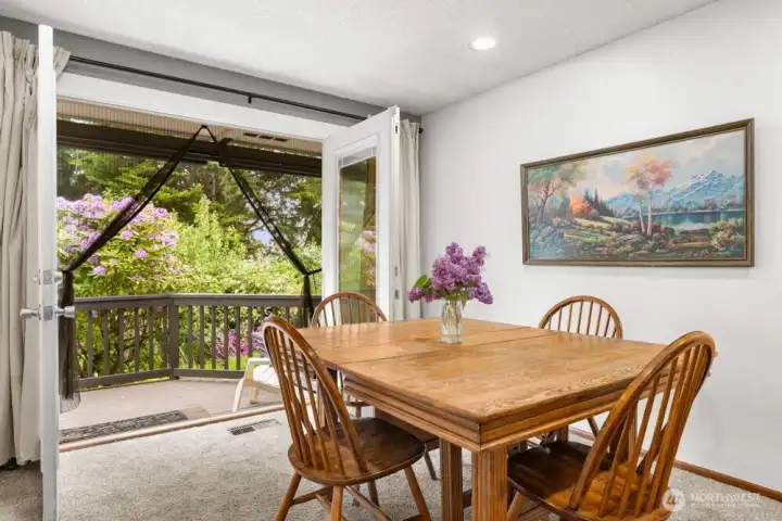 Dining space with french doors to the deck