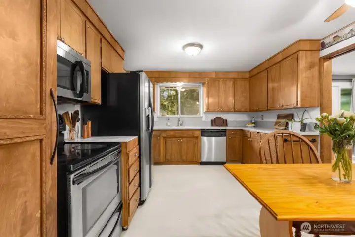 Kitchen with window looking into the backyard
