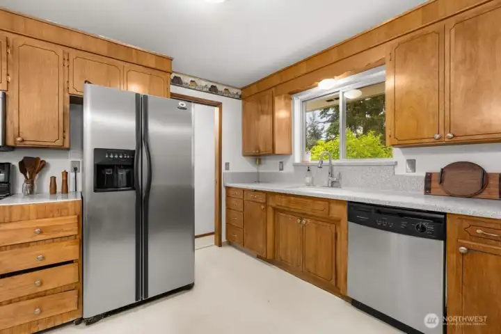 Kitchen showing access to the basement