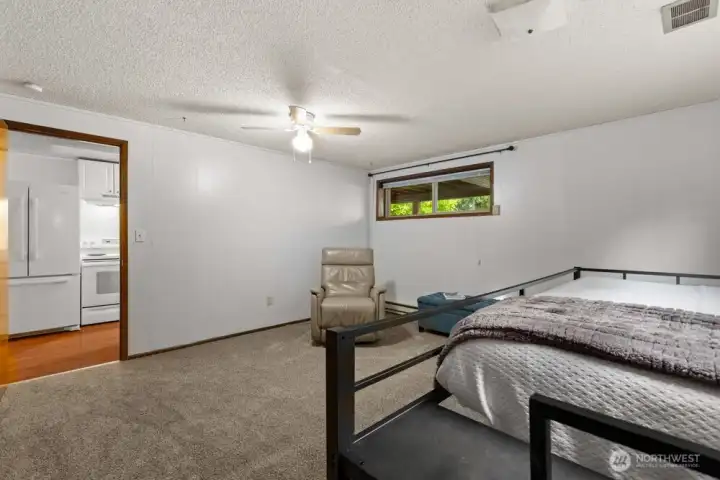 Fifth bedroom with access to basement kitchen