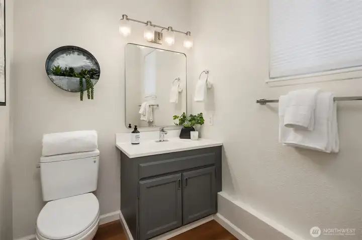 Convenient half bath on lower level.