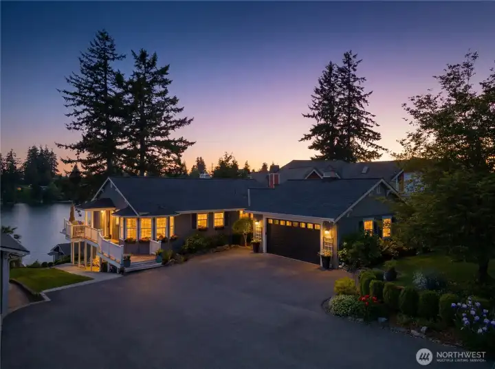 This lakeside beauty is a custom home like no other.  Rear of the home facing west is the perfect viewing area for sunsets over the lake.
