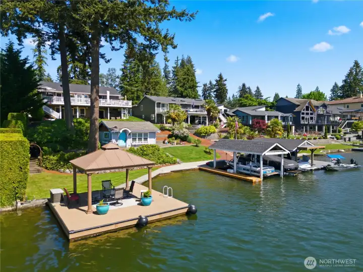 Dock has gazebo and covered boat garage with electric lift!