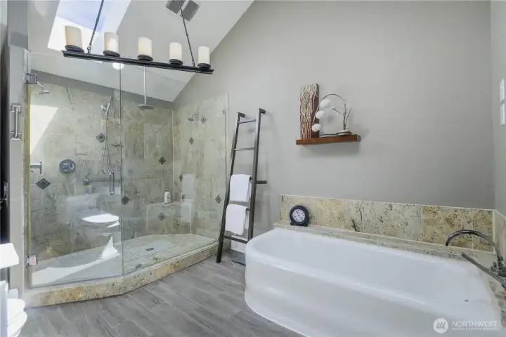 Incredible tile 3/4 shower with large soaker tub is sure to impress.