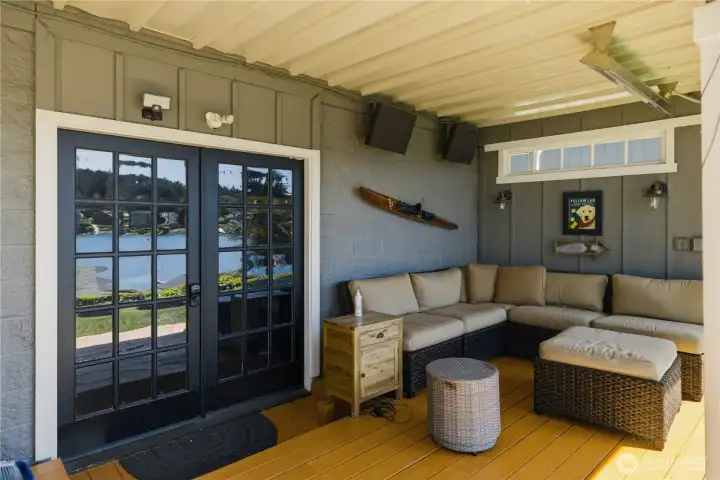Covered living area outside of daylight basement is incredible!  You will love the outdoor space for gatherings, entertaining and every day enjoyment.