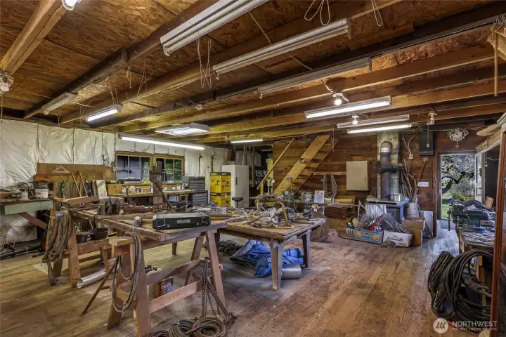 Massive woodshop is well lit Massive woodshop is well lit