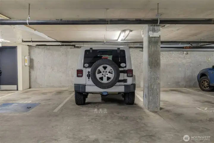 Prime PArking SPot right next to the door to the elevator.