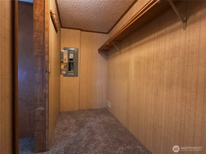 Walk-in closet, houses the electrical panel Walk-in closet, houses the electrical panel