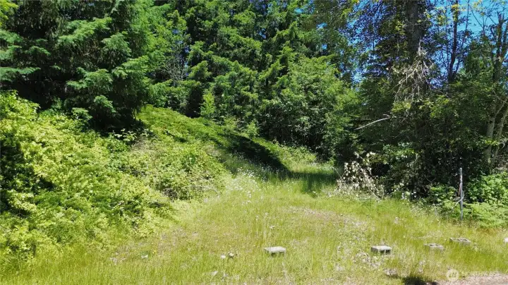 Additional space at the bottom of hill, allowing more parking Additional space at the bottom of hill, allowing more parking