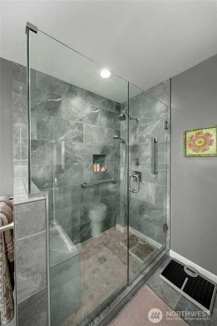 Primary walk-in Tile shower