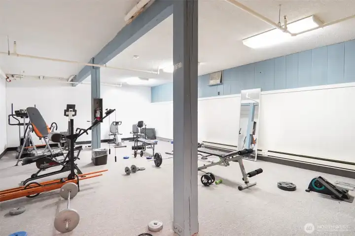 Community workout room with exercise equipment Community workout room with exercise equipment