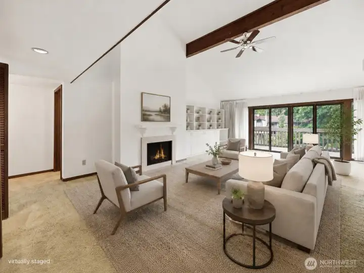 Great room with vaulted ceilings- virtually staged