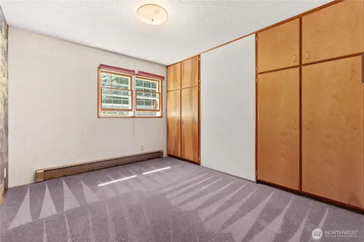 Third bedroom with built in closet space.