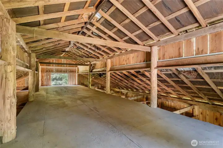 Spacious loft offers convenient hay storage above the horse stalls.