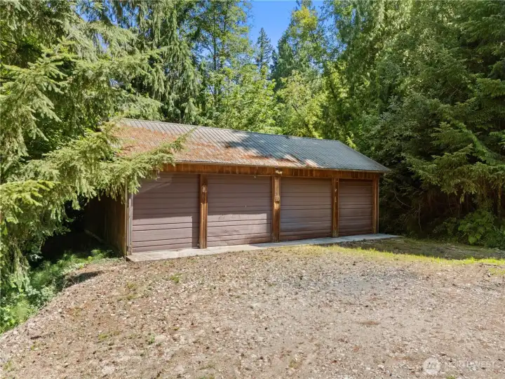 32' x 44' shop featuring four bays for vehicles, equipment, toys or projects.