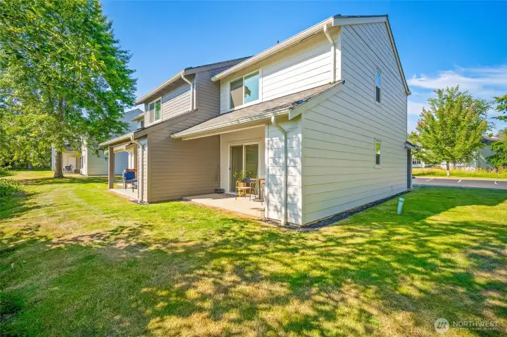 End unit with just nature behind and a nice sized yard next to it. No other buildings on that side!