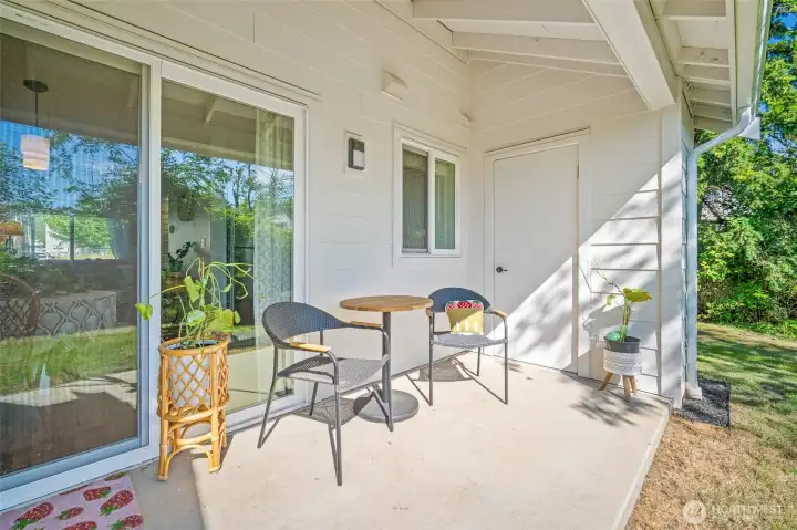 Relax on your covered back patio with just nature to the back and side of you. Nice storage too!