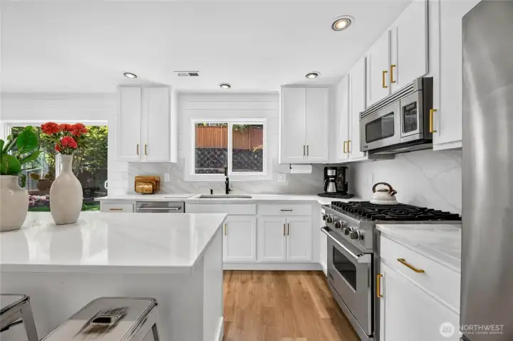 Your kitchen sink look directly out to the level and peaceful back yard. Your kitchen sink look directly out to the level and peaceful back yard.