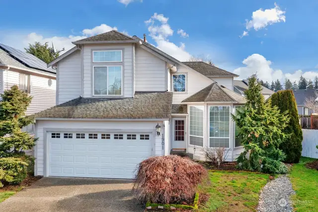 Street view of this well cared for 2 story home.