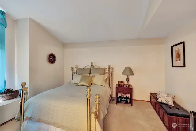 Spacious Primary suite on the upper level. Window seat area great place to relax and read a book. This room will easily accommodate a king bed and additional furniture.