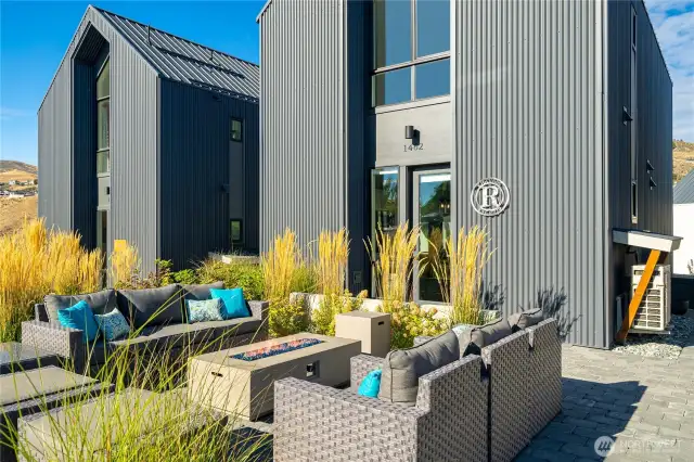 The front patio offers tons of seating with a fire pit, and wonderful views.
