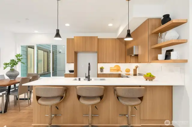 Extra seating space!   Photo is of Model Home of same floorplan and should be considered representative only. Color schemes may vary.